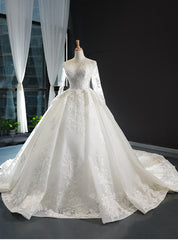 White Ball Gown Tulle Appliques Long Sleeve Wedding Dress With Train